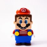 colorful plumber toy on white background