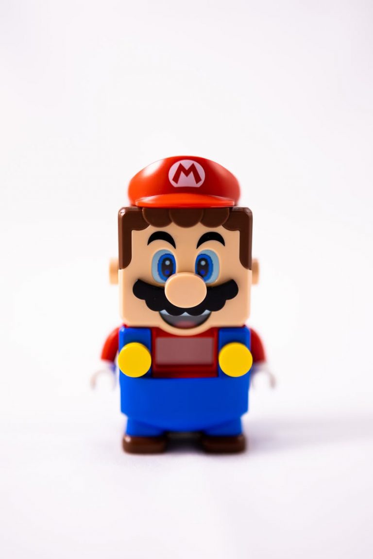 colorful plumber toy on white background